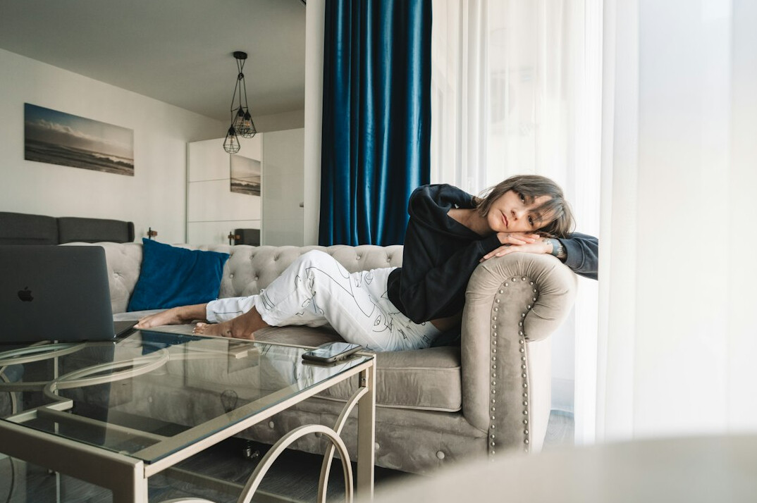 tired person on couch