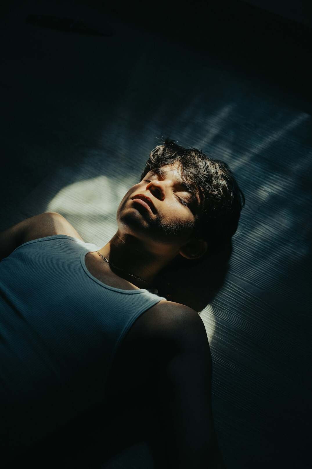 Studio portrait of a young male sleep and recovery coach
